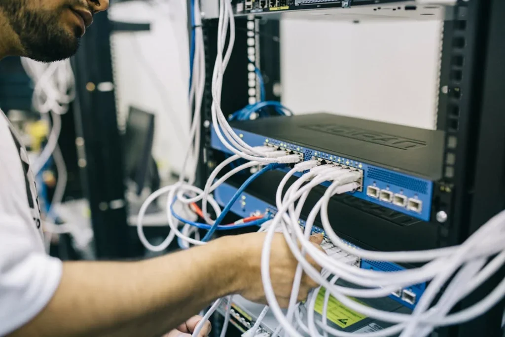 Technician performing work on computer network